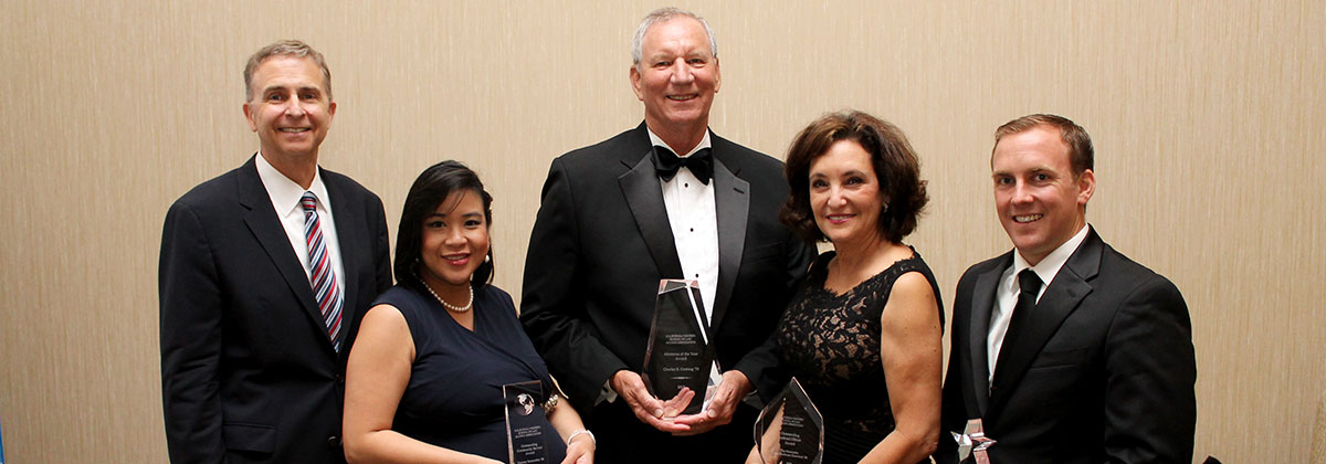 Dean Niels Schaumann (left) with Distinguished Alumni Award winners Tammy Sumontha ’00, Charles R. Grebing ’70, the Hon. Karen S. Crawford ’80, and Michael A. Semanchik ’10